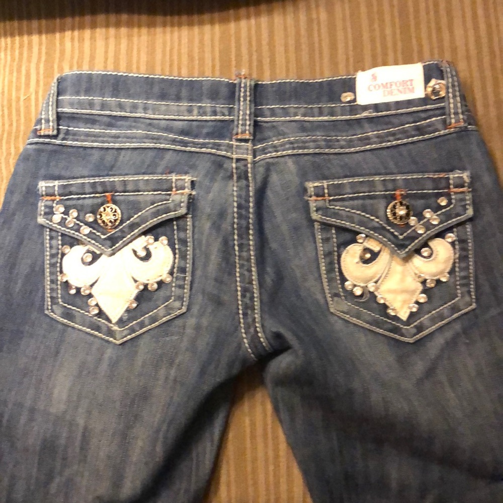 Distressed low rise jeans